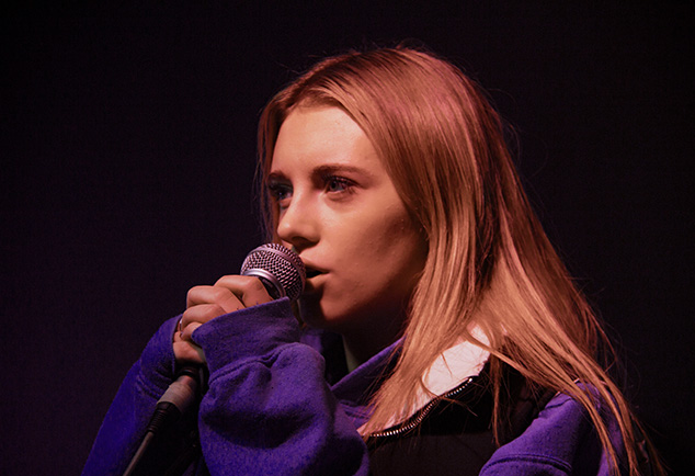 Woman holding mic