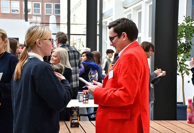 Student speaking to employer at Velocity event